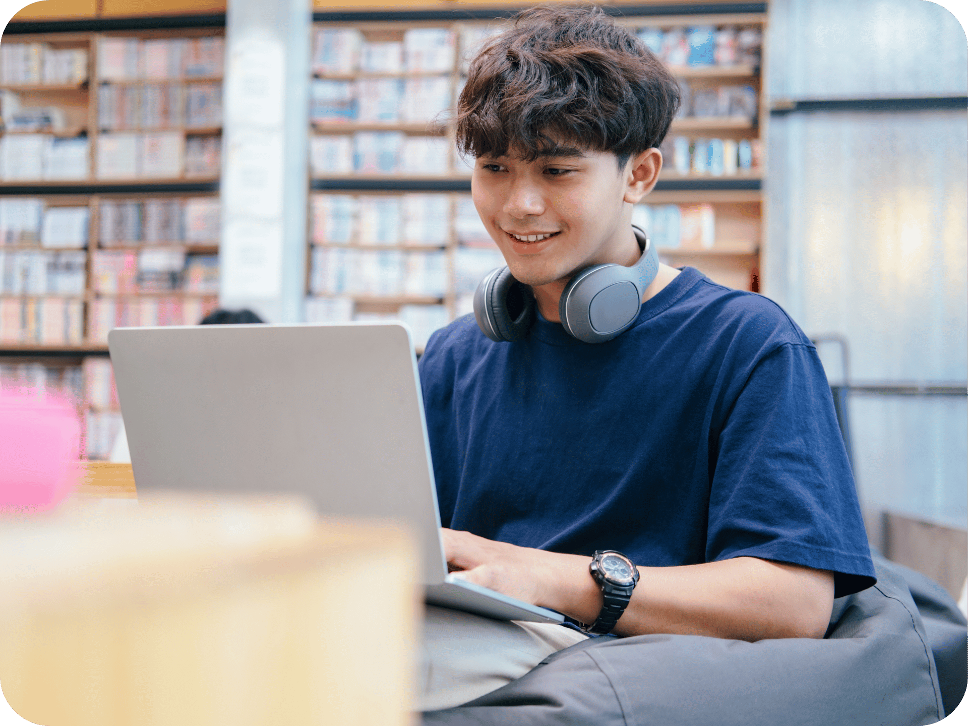 Student Reading an eBook on a Laptop