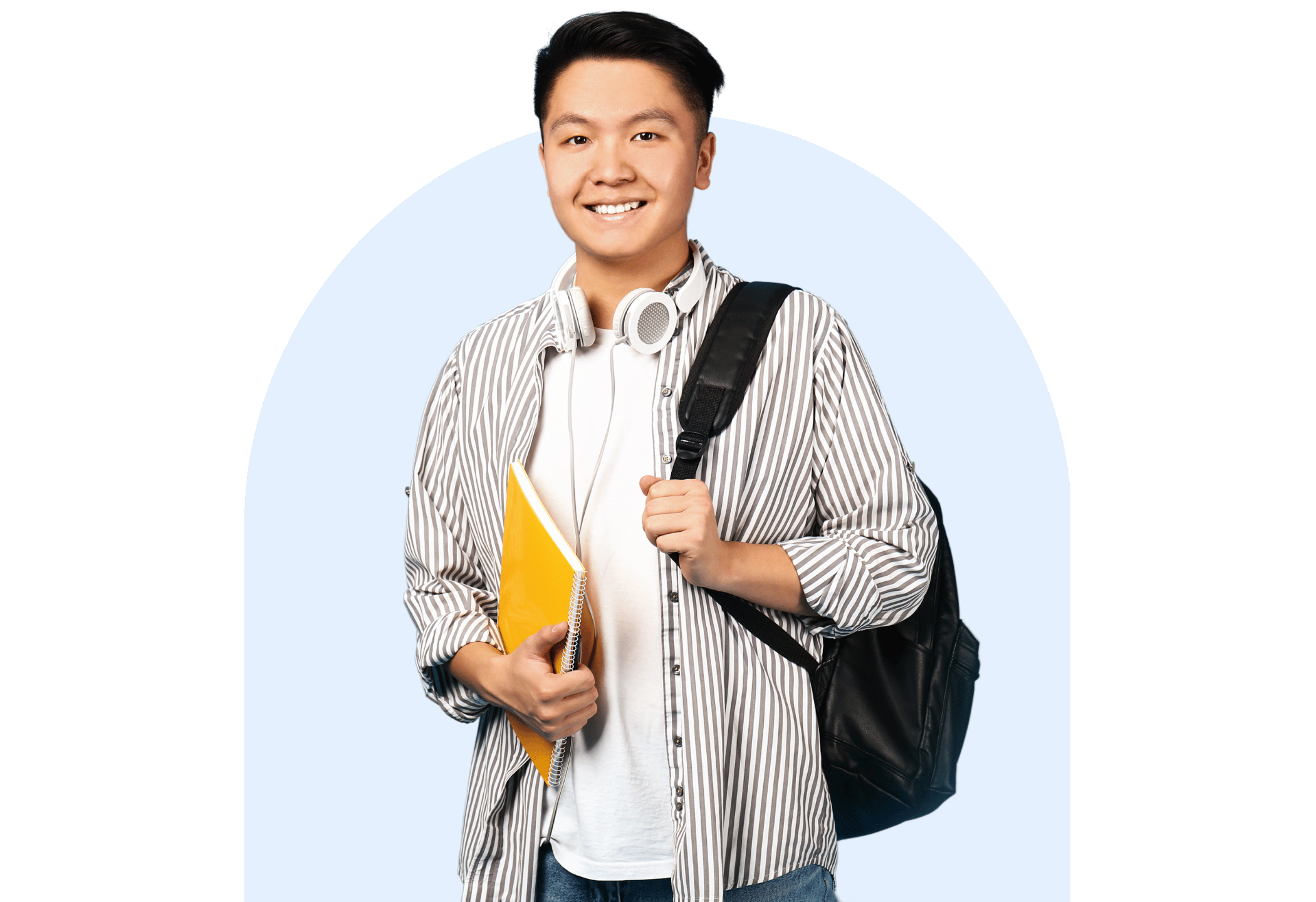 Smiling small school student wearing headphones and carrying a backpack, holding a yellow notebook.