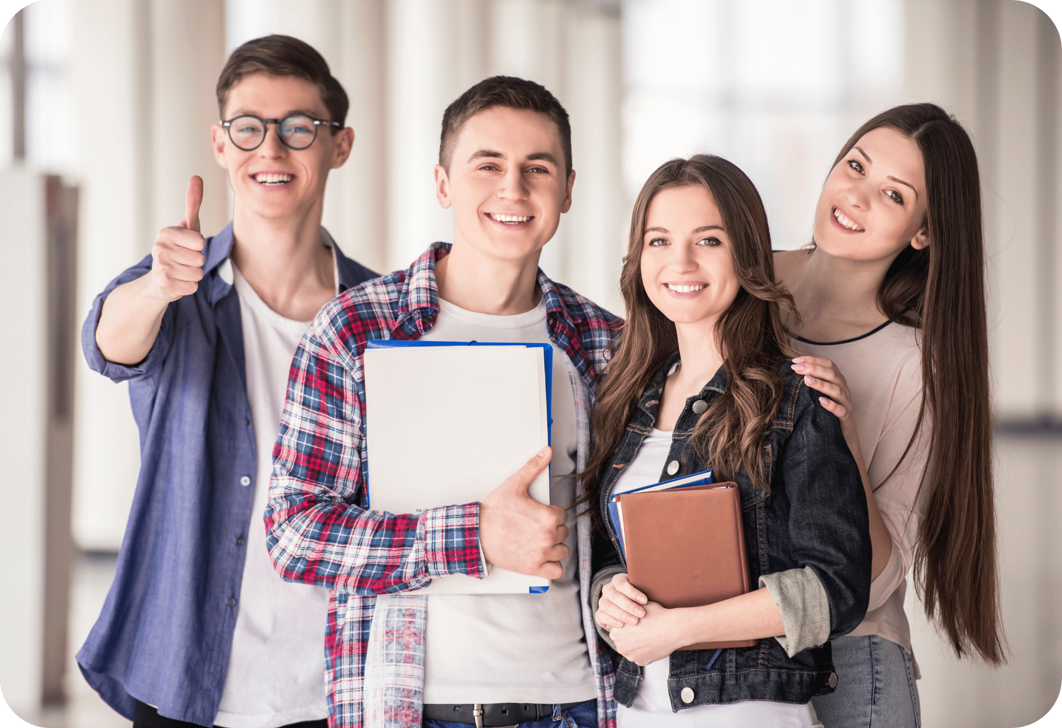 Four high school students smiling
